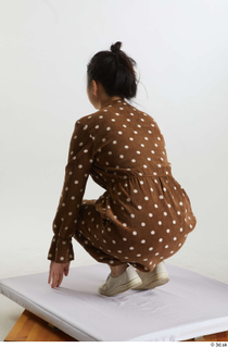 Aera  1 brown dots dress casual dressed kneeling white…